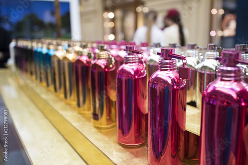 colorful perfume bottles on the counter photo