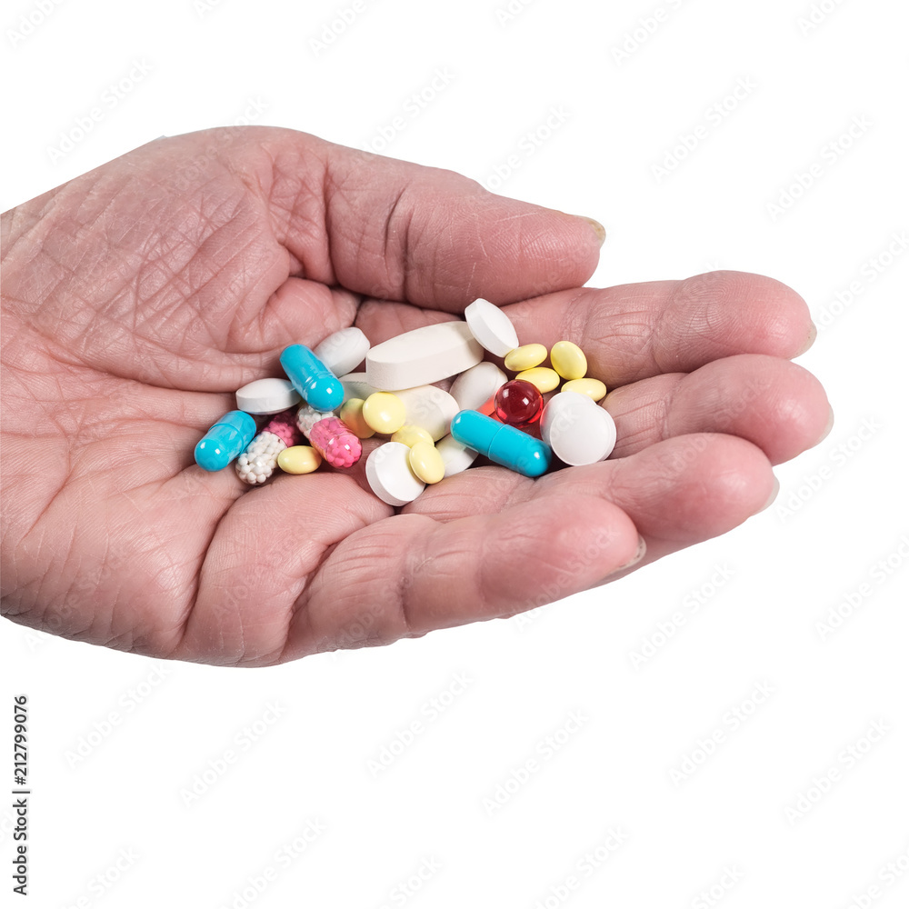 Female palm with pills isolated on white background Female palm with pills isolated on white background