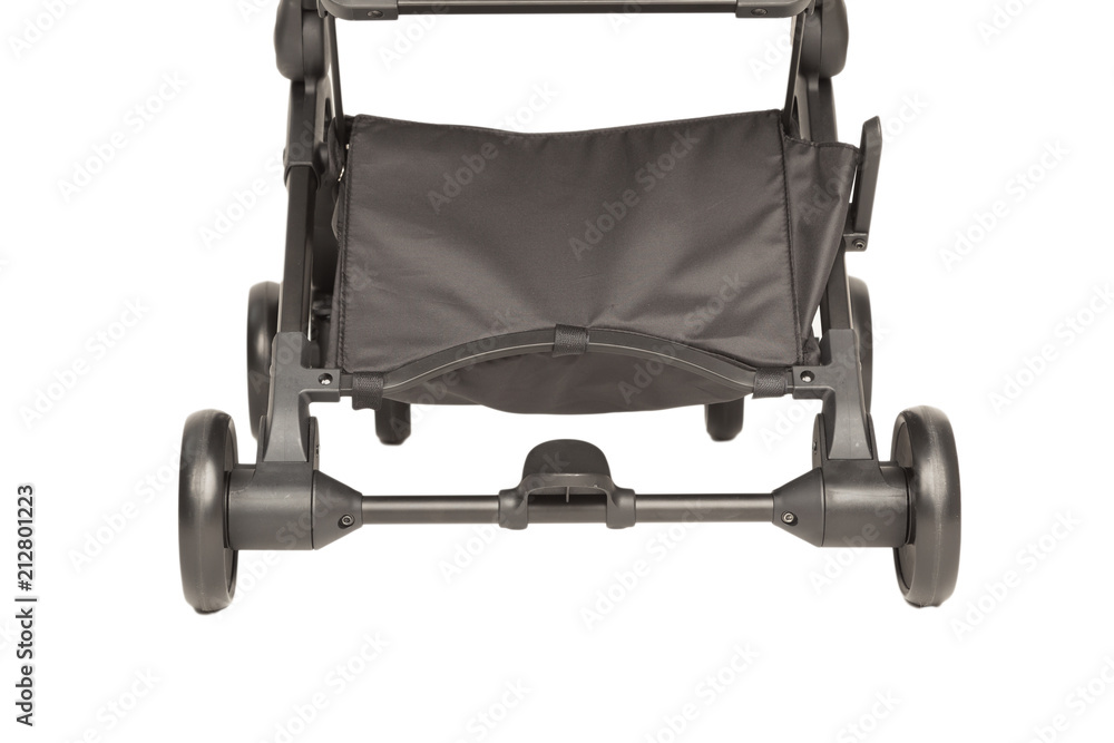 A stroller on a white background, details of a stroller close-up. A stroller on a white background, details of a stroller close-up.