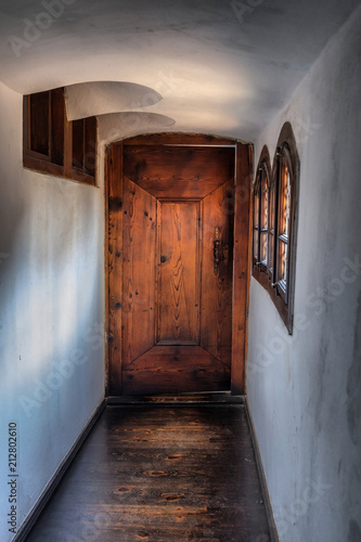 View about the entrance of a small watchtower, old fortification, Bran, Romania photo