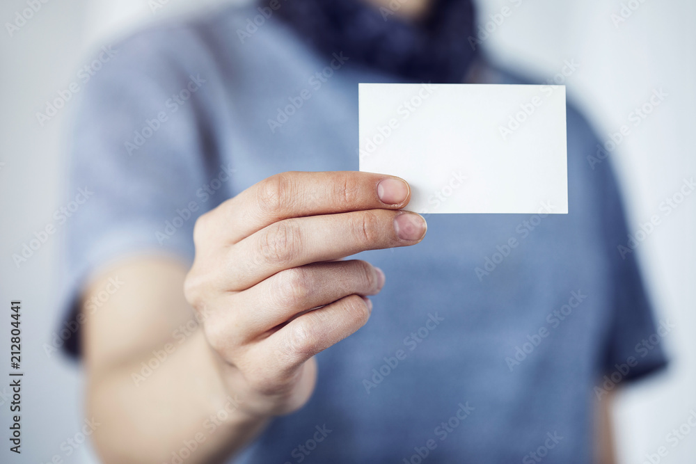 Business woman showing business card Business woman showing business card