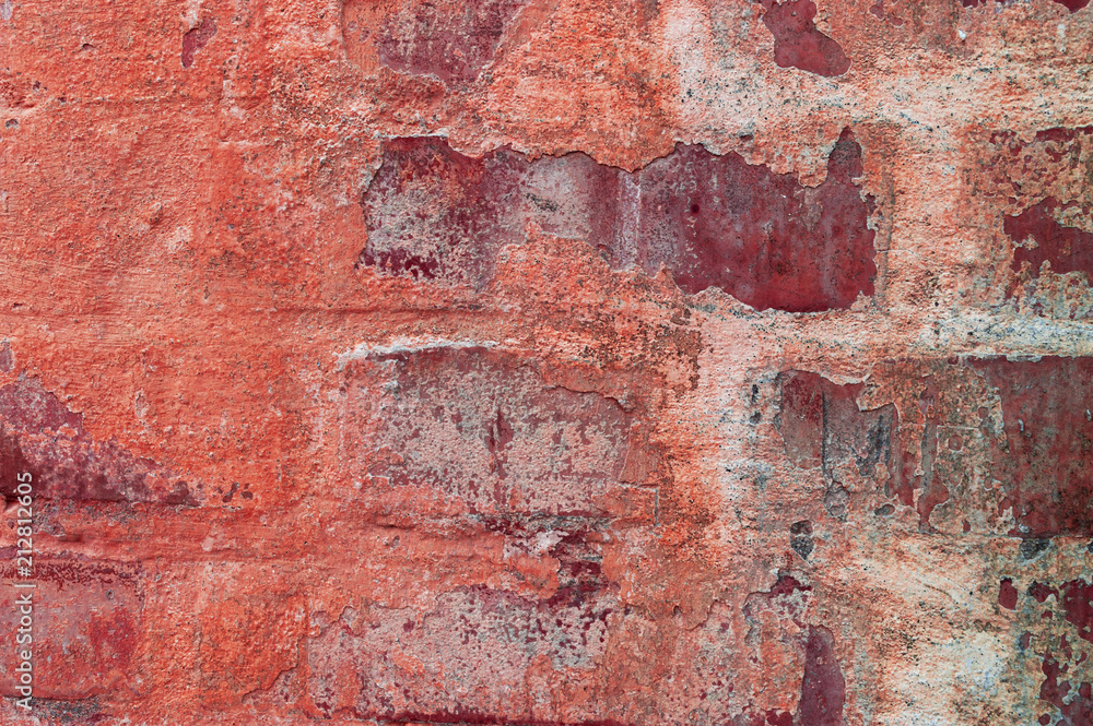 red brick wall during the day in the city red brick wall during the day in the city