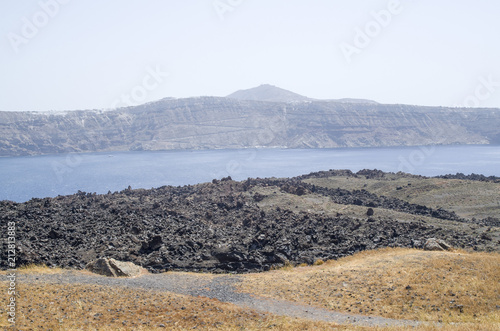 View from the top of Nea Kameni to island Santorini
