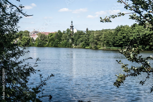 Bransky rybnik pond with Zdar nad Sazavou city on the background in Czech republic