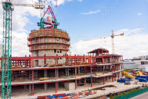 Lots of tower Construction site with cranes and building with blue sky photo