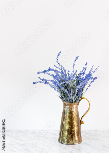 Fototapeta Naklejka Na Ścianę i Meble -  Blue lavender in antique metal jar