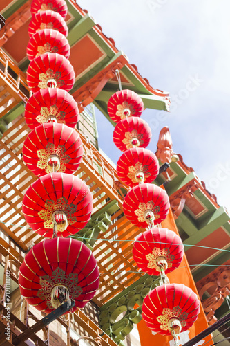 Wall Mural red hanging Chinese lanterns on a sunny day