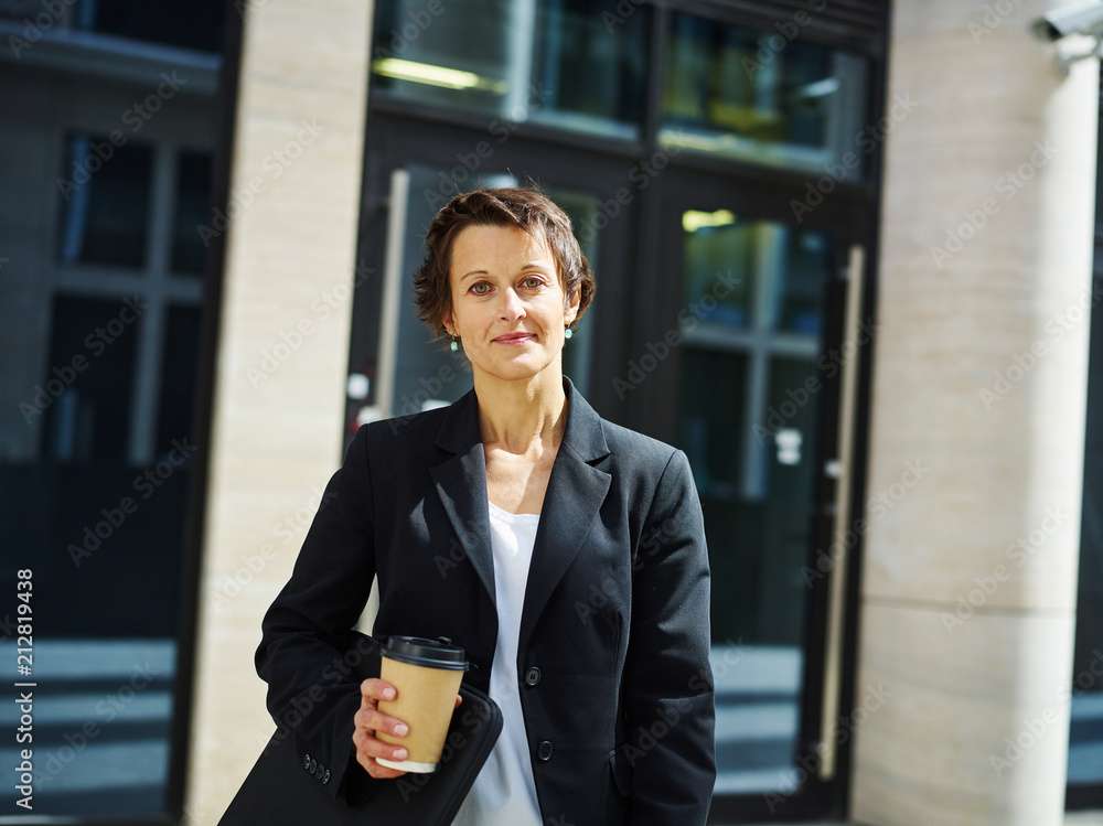 Executive adult woman on street Executive adult woman on street