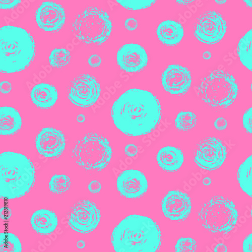 Bright seamless pattern with grunge scratched blue circles on pink. Fashion contrast colors scribbled round elements texture for textile, wrapping paper, background, surface, graphic design, wallpaper