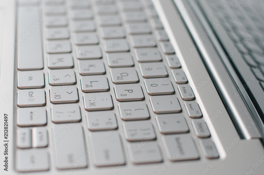 Computer keyboard buttons closeup. Laptop in macro Computer keyboard buttons closeup. Laptop in macro
