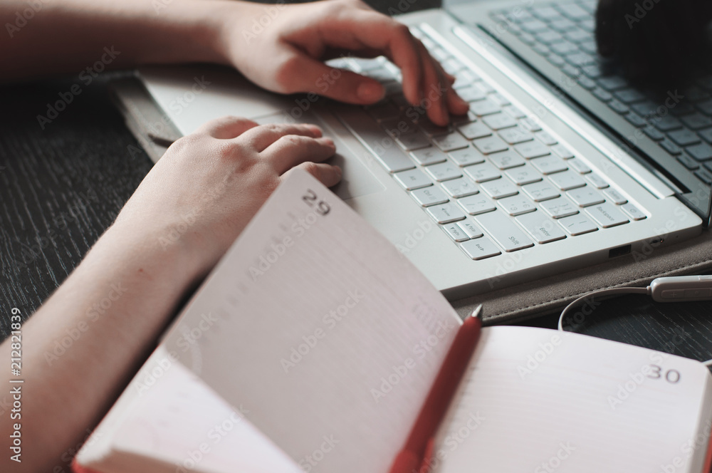 Notebook and laptop using by woman Notebook and laptop using by woman