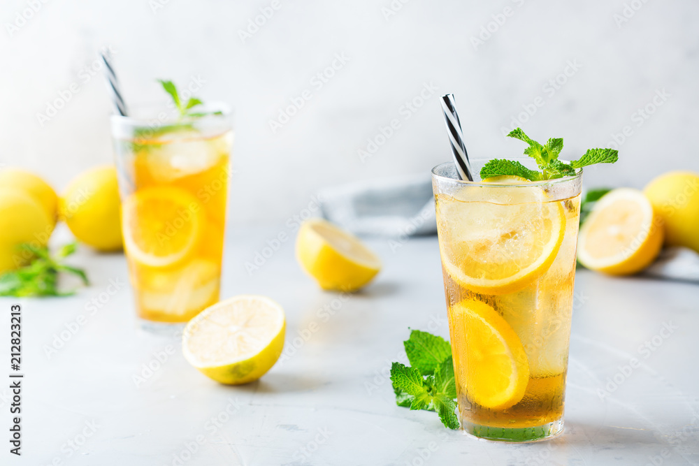 Lemon mint iced tea cocktail refreshing drink for summer days Lemon mint iced tea cocktail refreshing drink for summer days