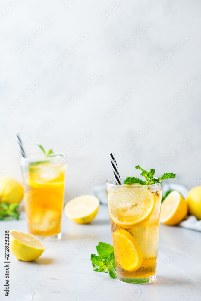 Lemon mint iced tea cocktail refreshing drink for summer days Lemon mint iced tea cocktail refreshing drink for summer days