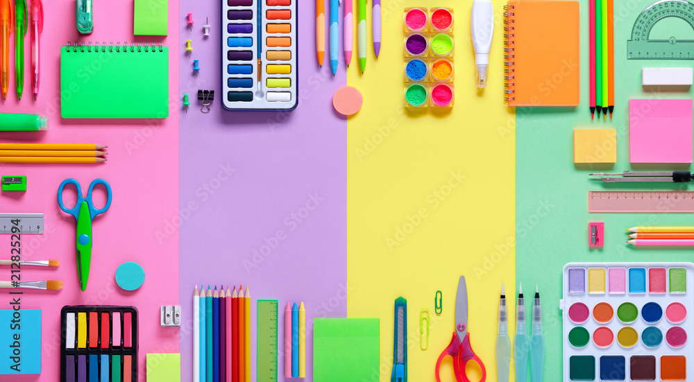School Supplies In Frame With Colorful Paper Background
School Supplies In Frame With Colorful Paper Background