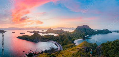 Panoramic colorful sunset view of Padar Island in an evening from Komodo Island (Komodo National Park), Labuan Bajo, Flores, Indonesia photo