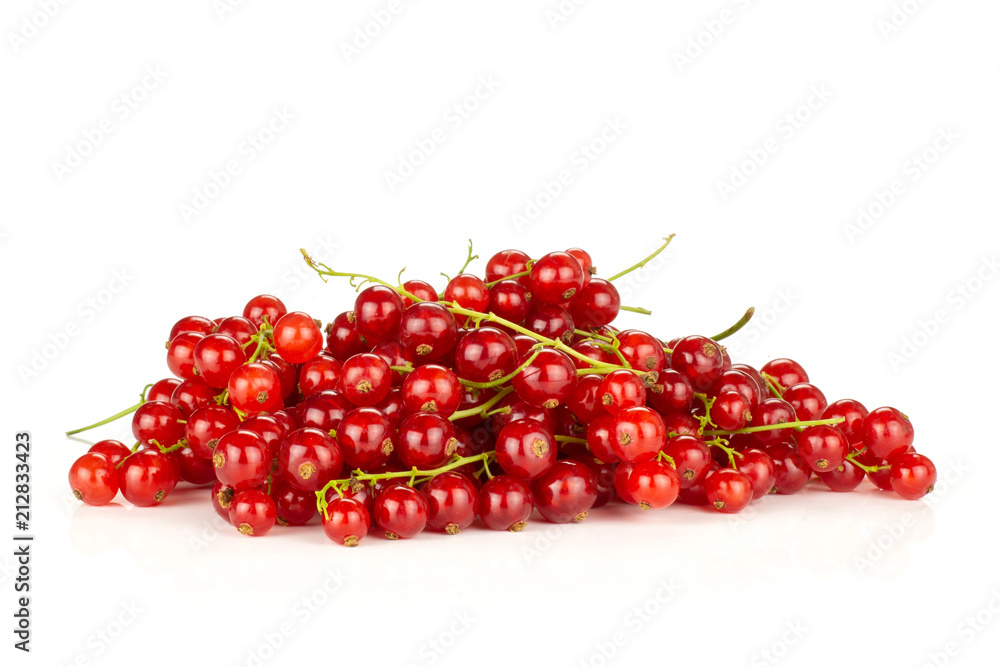 Red currant berry heap isolated on white. Red currant berry heap isolated on white.