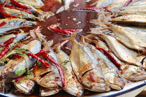 Boiled fish sauce at market