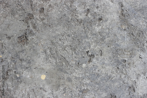 Abstract dirty rough holey perforated unpolished cement concrete texture
