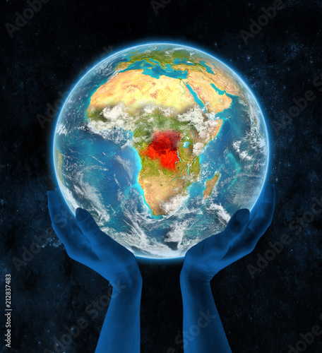 Φωτογραφία Democratic Republic of Congo on planet Earth in hands