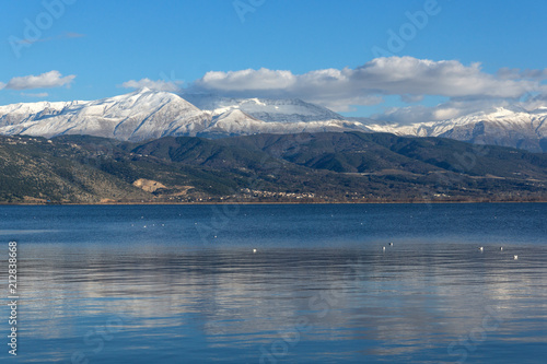 Amazing winter Landscape of Lake Pamvotida and Pindus mountain from city of Ioannina, Epirus, Greece © Stoyan Haytov