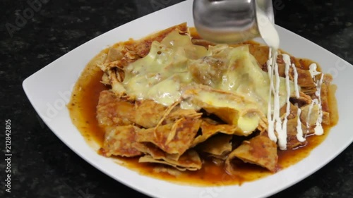 Mexican Food - hands cooking Chilaquiles