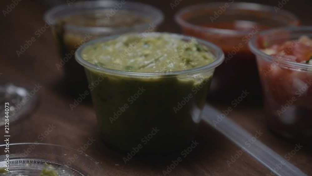 Slow motion video of salsas and guacamole from chipotle Slow motion video of salsas and guacamole from chipotle