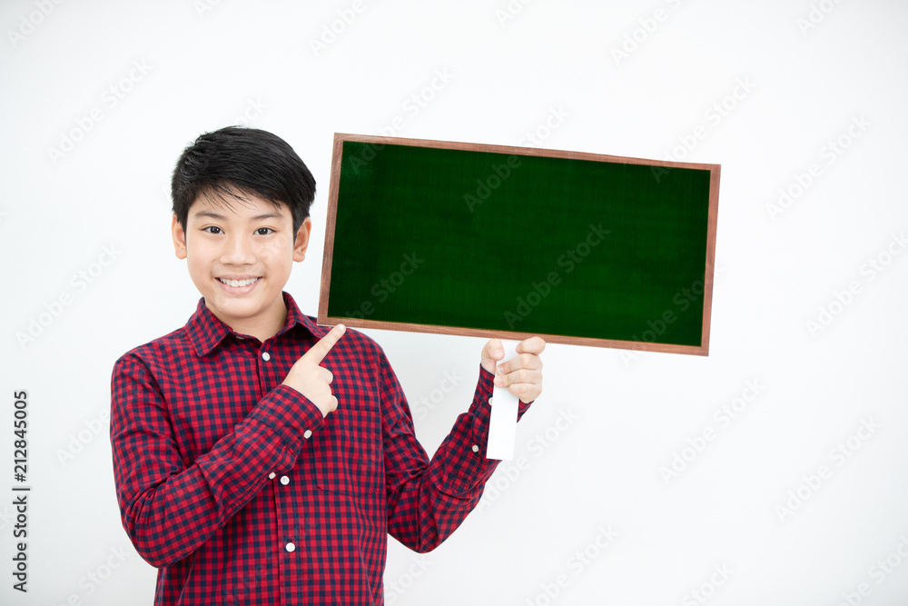 Asian boy smiling and hand holding green blank board. Asian boy smiling and hand holding green blank board.