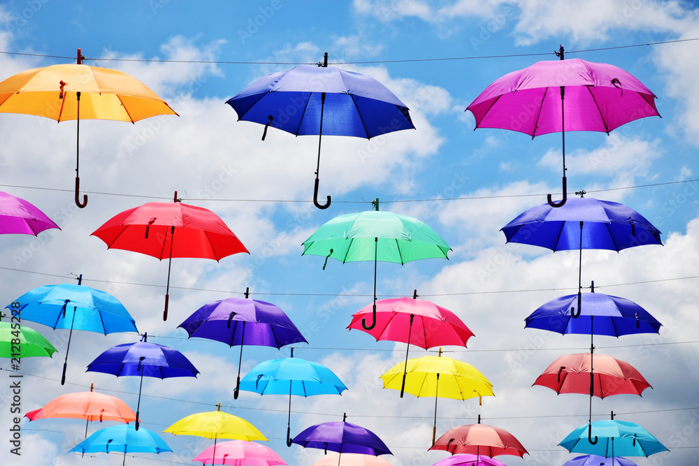 Colorful umbrella on white background