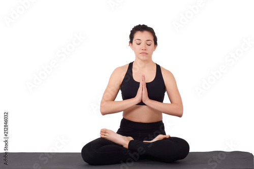 Young latin woman doing yoga pose.