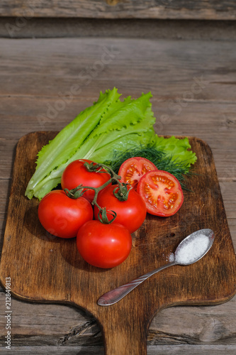 tomato vegetables on cutting Board