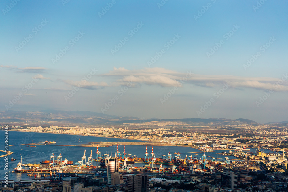 Aerial view industrial cargo port with ships and cranes