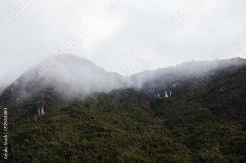 Landscape of green Andes mountains and clouds on the background. Peru. No people.