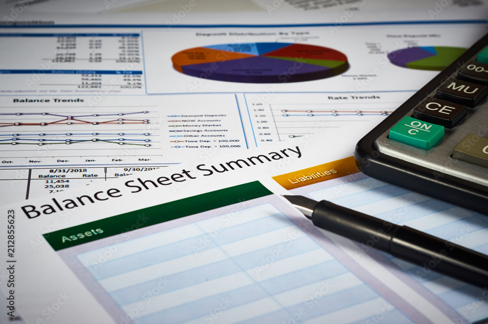 balance sheet summary and balance sheets with calculator and pen balance sheet summary and balance sheets with calculator and pen