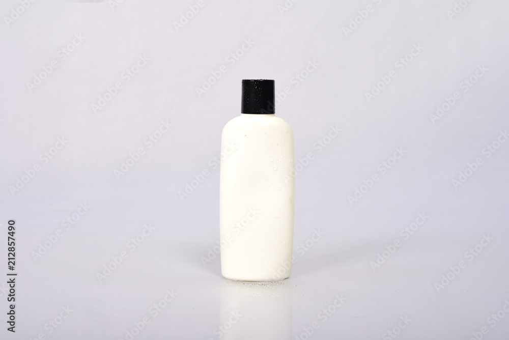 Plastic Blank White Bottle on grey background Plastic Blank White Bottle on grey background