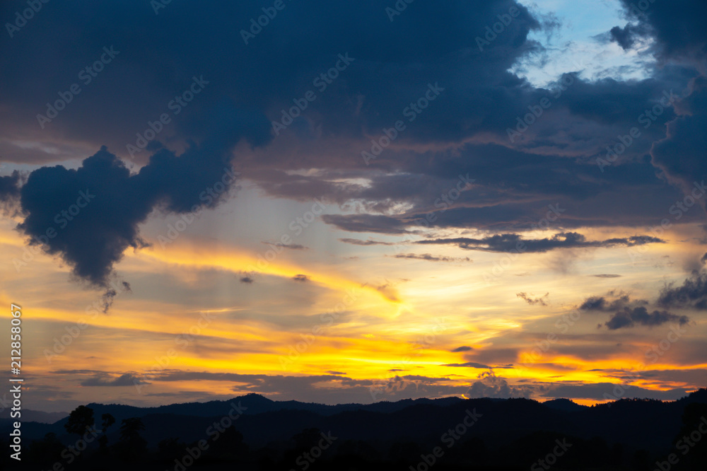 landscape of clouds sky sunset over mountains