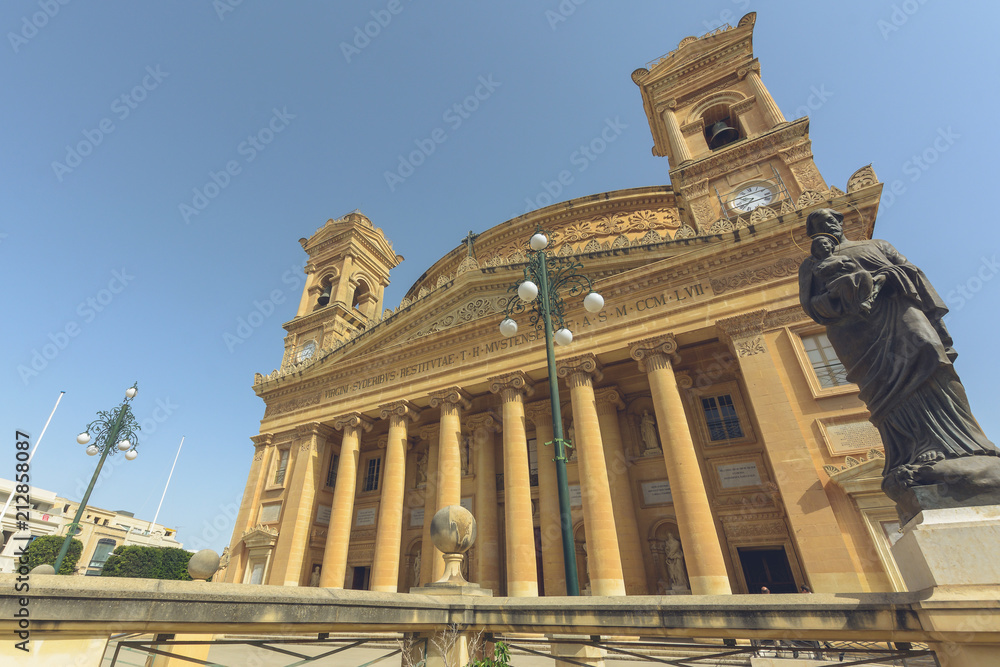 Rotunda Mosta Malta, Domed 17th-century Catholic Church with neoclassical architecture and replica WWII bomb on display, Dutch angle