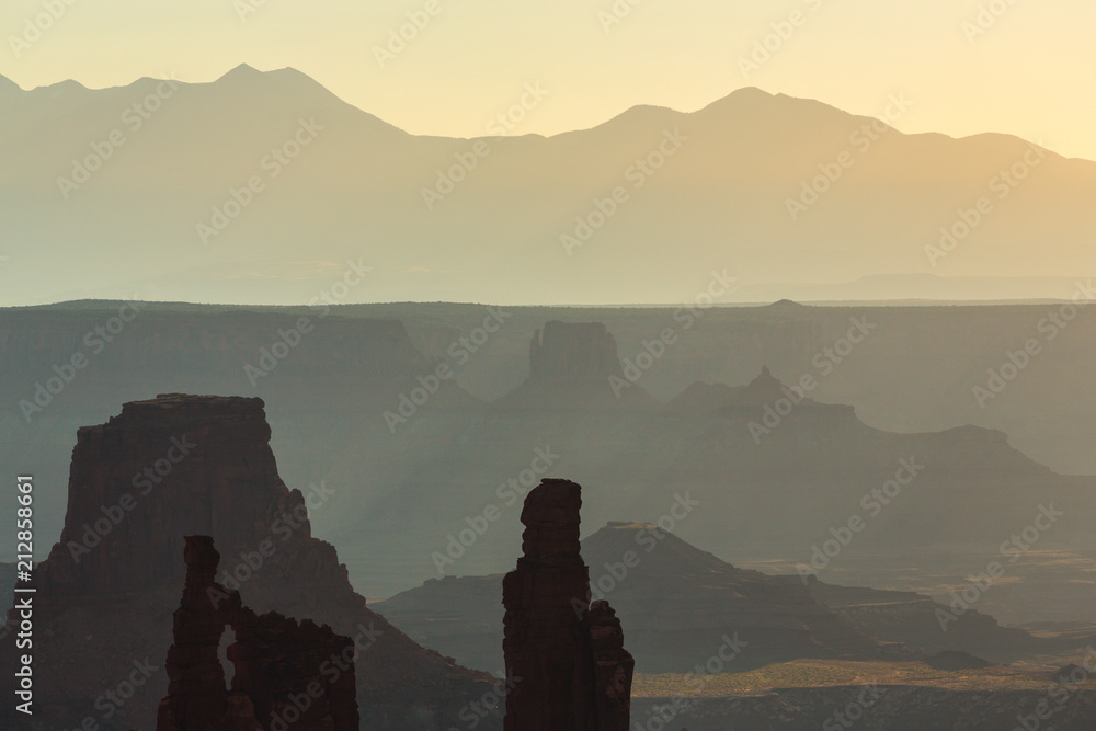 Fototapeta premium Beautiful sunrise scenery at Mesa Arch, Arches National Park, Utah, on a clear summer day