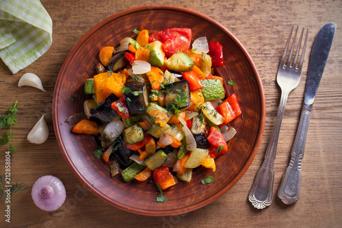 Vegetable stew: eggplant, pepper, tomato, zucchini, carrot and onion. Stewed vegetables salad. overhead, horizontal photo