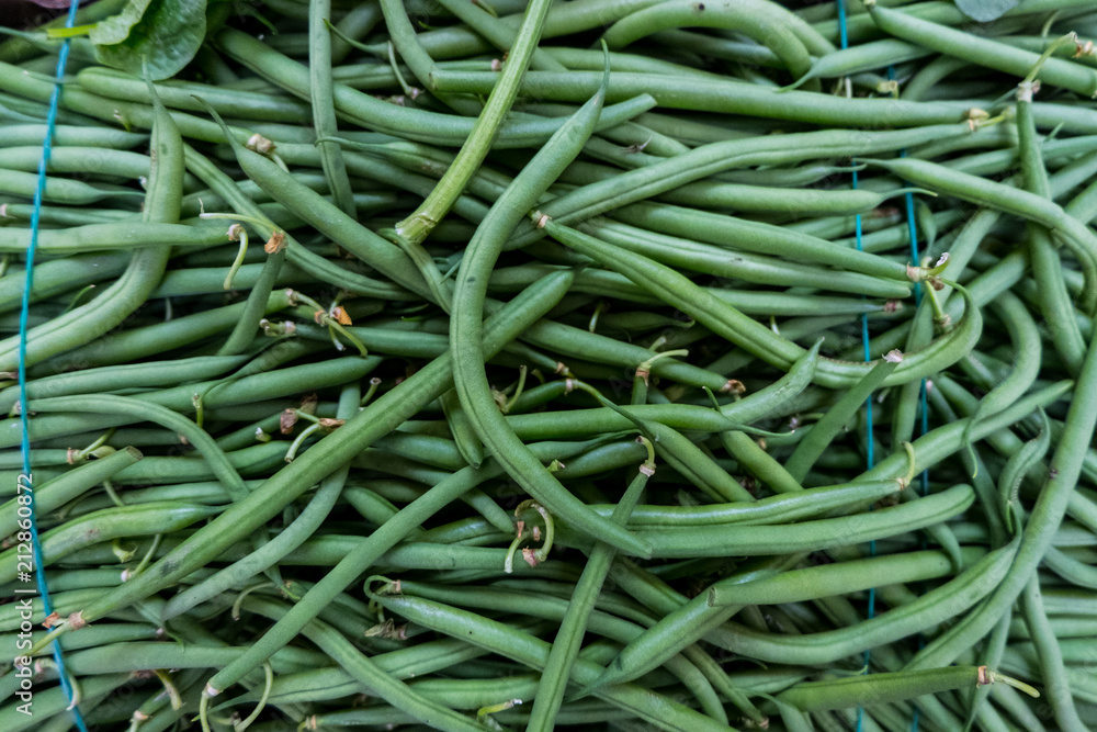 City market stall with fresh green beans. Rome. Europe. No people. City market stall with fresh green beans. Rome. Europe. No people.