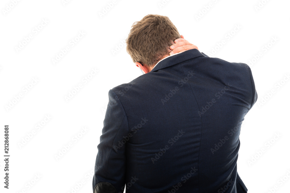 Back view of business man showing neck pain gesture. Back view of business man showing neck pain gesture.