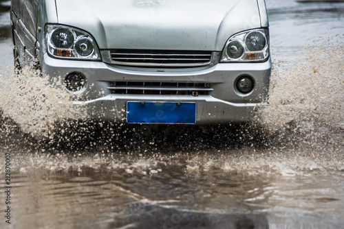 dirty water splash after vehicle roaring by