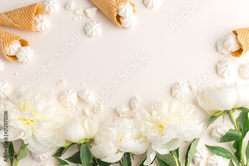 Flat Lay with Spring Flowers on Beige