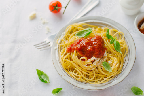 Pasta dish with tomato sauce on white plate