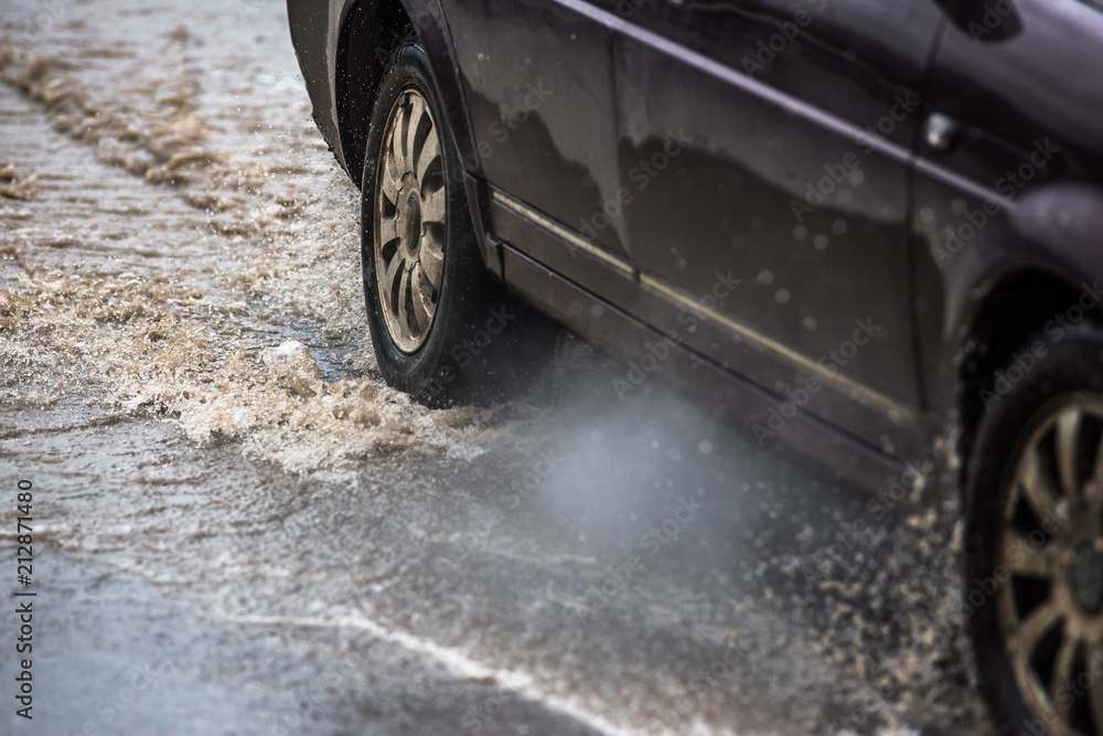 dirty water splash after vehicle roaring by