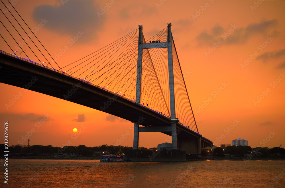 Silhouette of Vidyasagar setu bridge over river ganges at sunset. Silhouette of Vidyasagar setu bridge over river ganges at sunset.