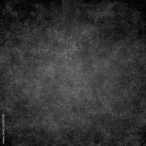 Black designed grunge texture. Vintage background with space for text or image © pupsy