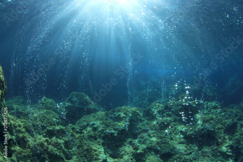 Underwater ocean background with air bubbles in water     © Richard Carey
