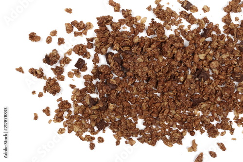 Crunchy chocolate granola, muesli pile isolated on white background, top view