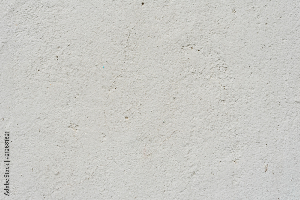 Fototapeta premium Wall fragment with scratches and cracks