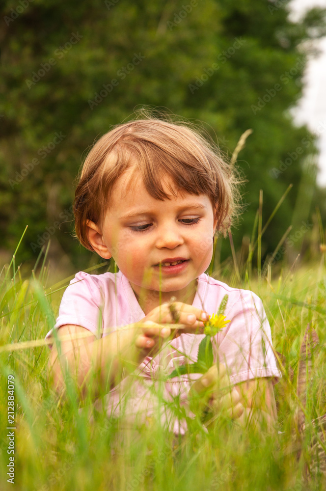 Leisure little girl in the village. Summer photography. Leisure little girl in the village. Summer photography.